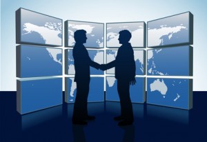 Business people shake hands in agreement 